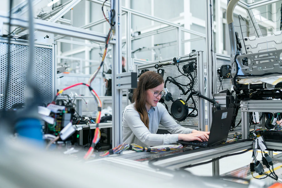 Professional reviewing operations inside a specialty facility